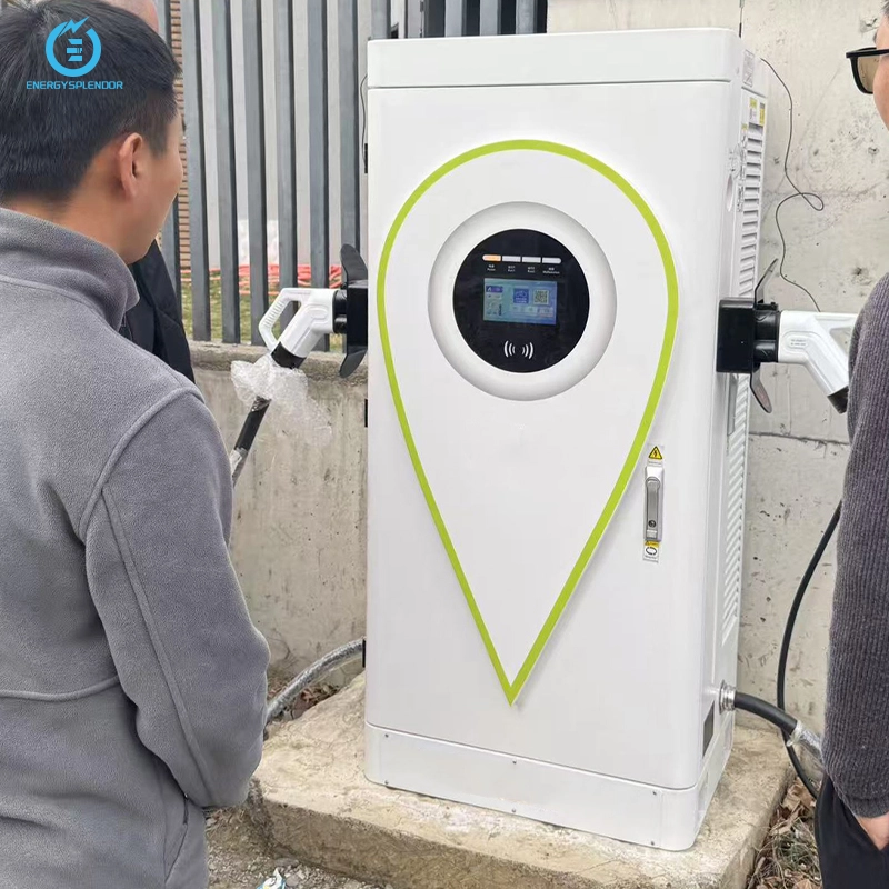 Outdoor DC electric vehicle charging cabinet in operation, with users interacting near the unit, featuring a dual charging gun design and central display.