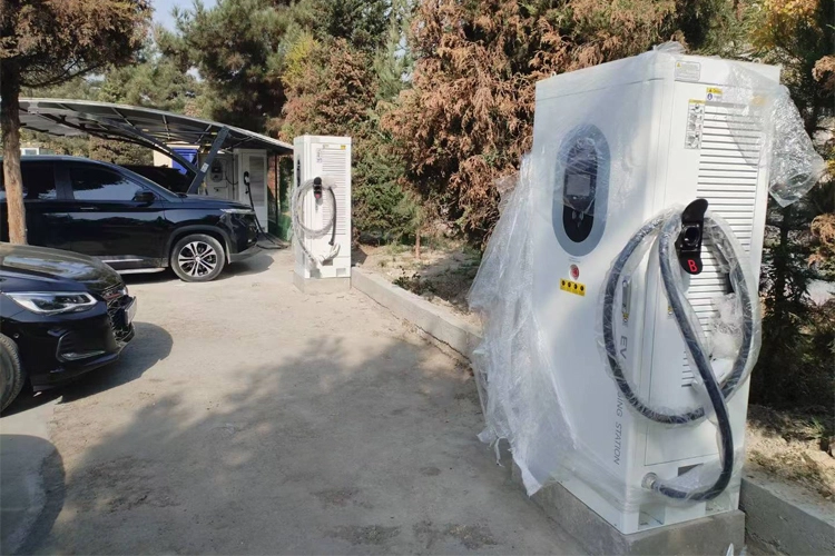 Newly installed EV charging units in Kazakhstan, featuring DC fast chargers for electric cars at outdoor stations.