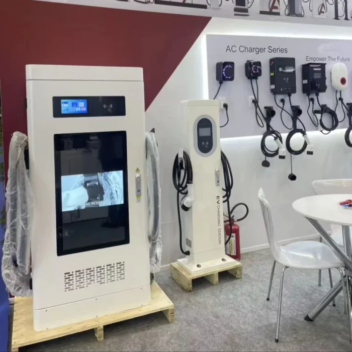 Commercial EV charging stations on display showing AC and DC charger series for electric vehicles in an exhibition booth.
